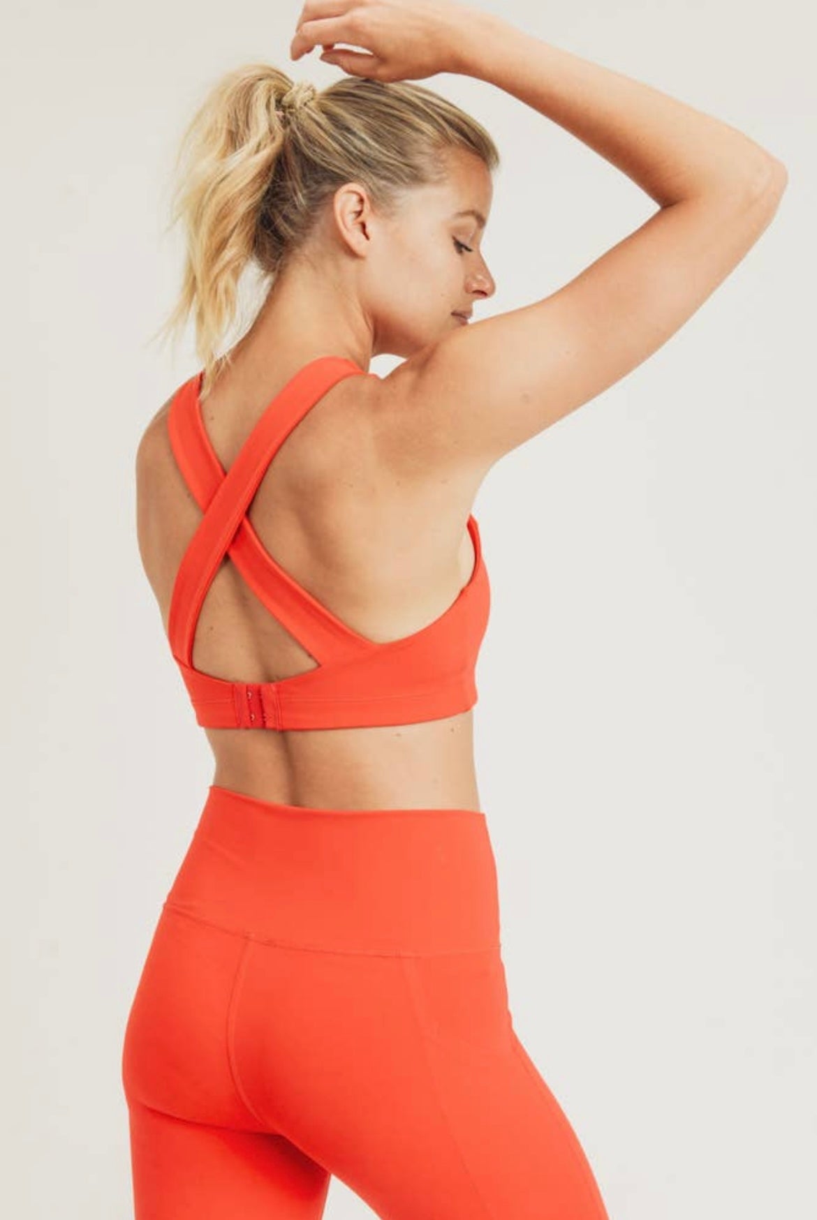 The Poppy Tangerine Adjustable Sports Bra