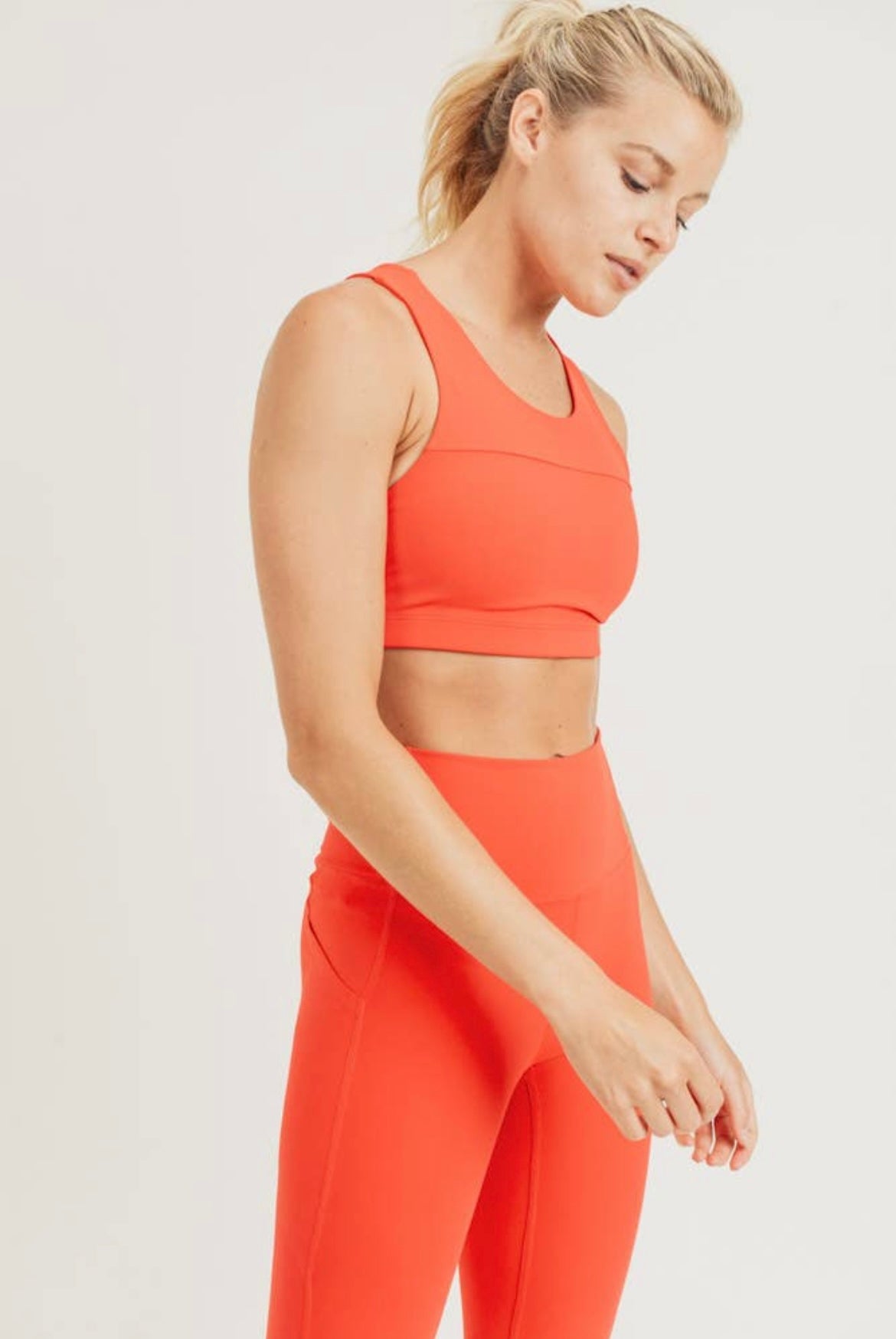 The Poppy Tangerine Adjustable Sports Bra