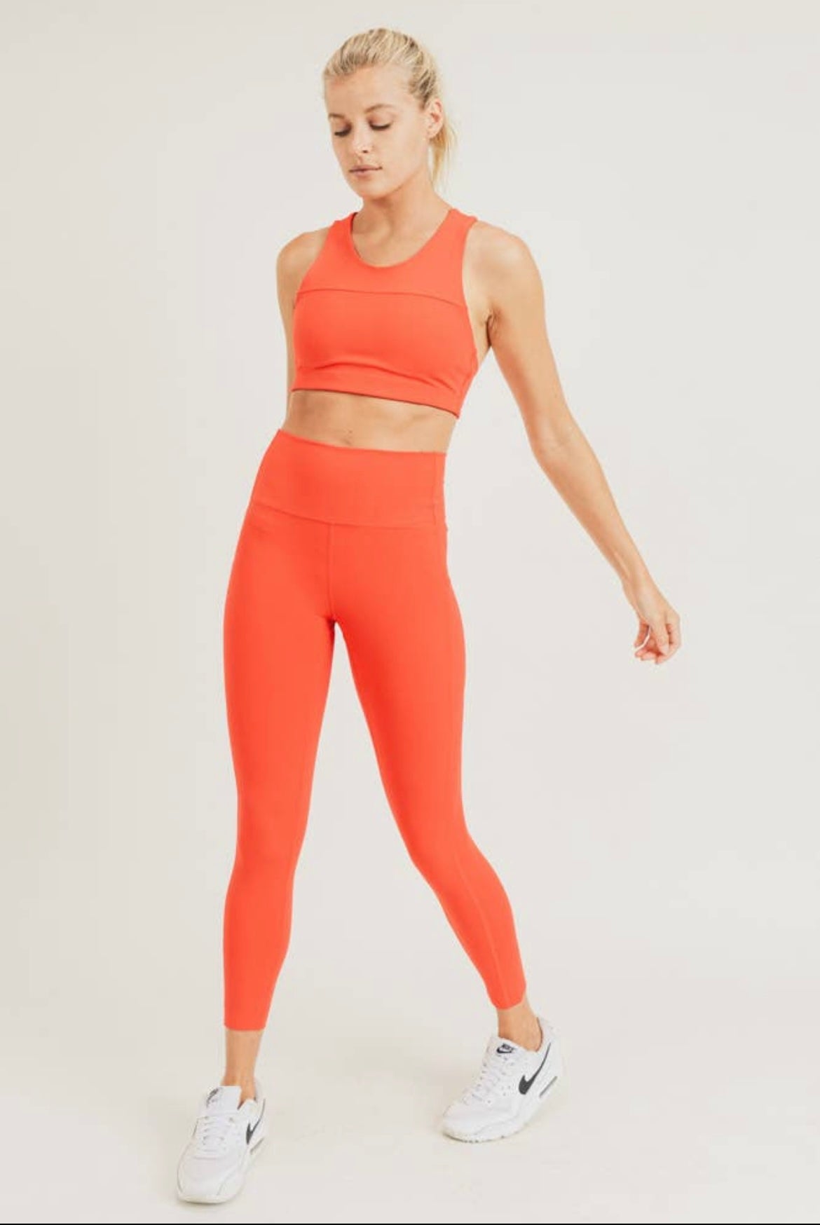 The Poppy Tangerine Adjustable Sports Bra