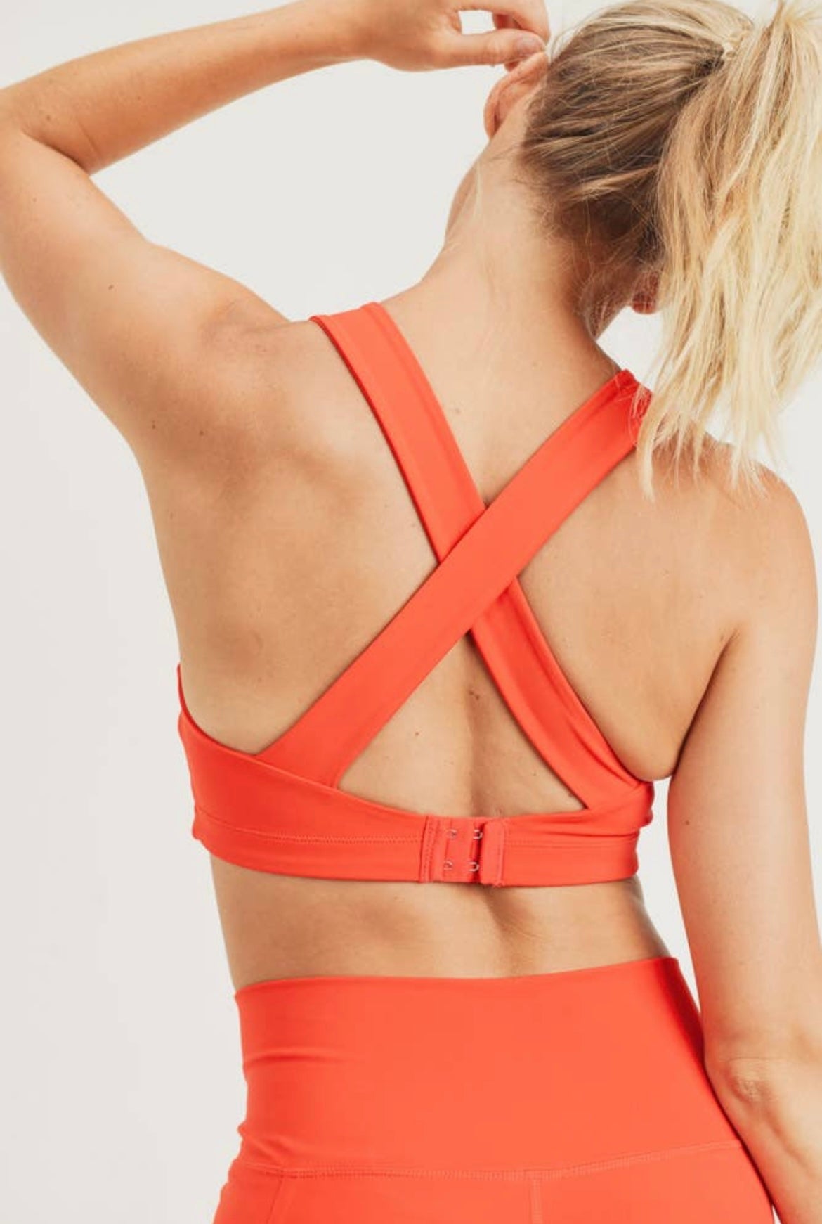 The Poppy Tangerine Adjustable Sports Bra